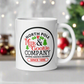 This ceramic glossy coffee mug says North Pole Milk and Cookie Company Baking Santa's Favorite Since 1896. It features little green trees and holly leaves and berries.