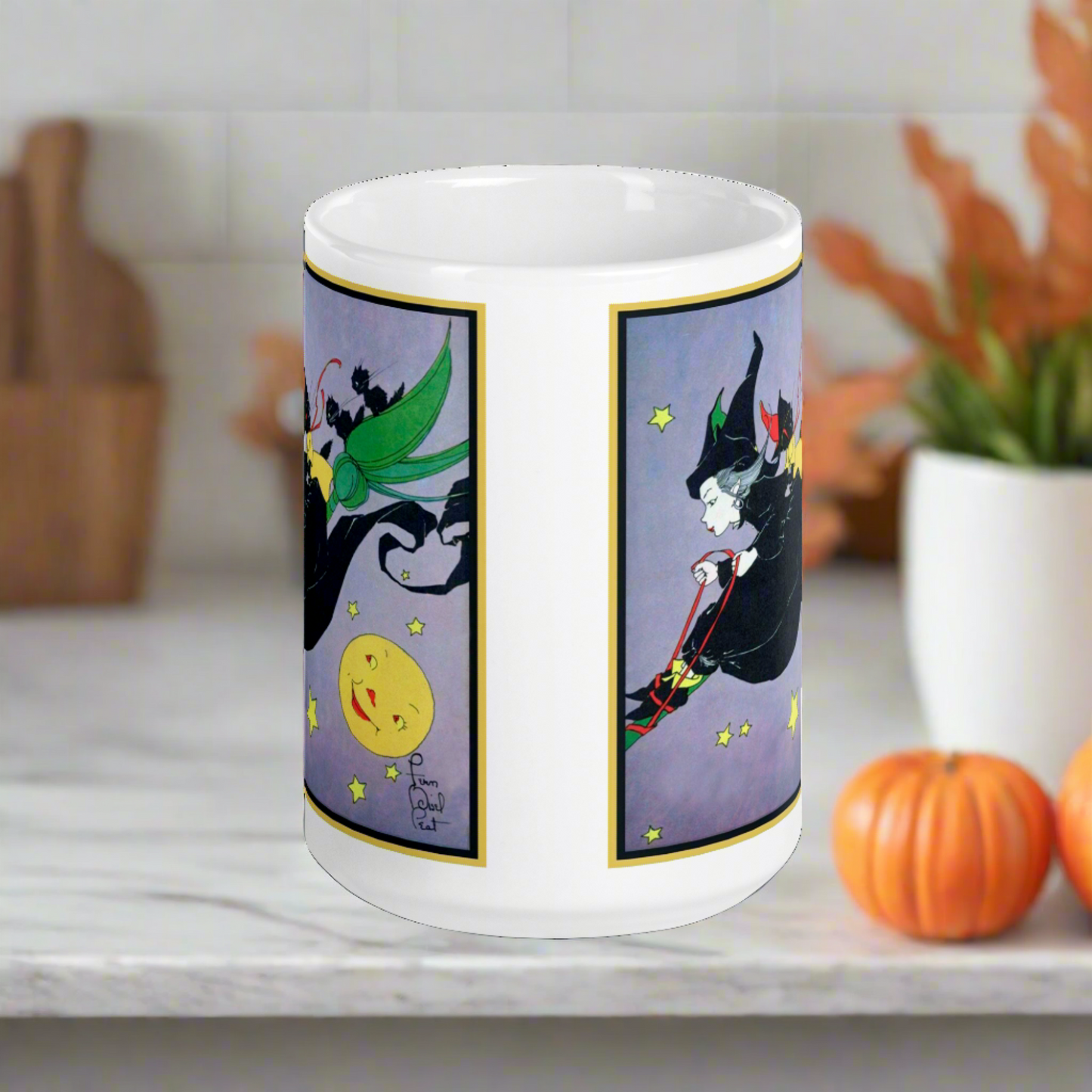 This ceramic glossy mug features a vintage Halloween illustration by Fern Bisel Peat. It features a witch dressed in all black soaring through the air on her broom with black cats. There is a smiling full yellow moon.