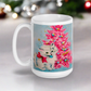 This glossy ceramic coffee cup features an adorable vintage retro print of a white christmas kitten with a blue ornament in her mouth. She is wearing a pink bow and is sitting next to a pink Christmas tree with a blue background.