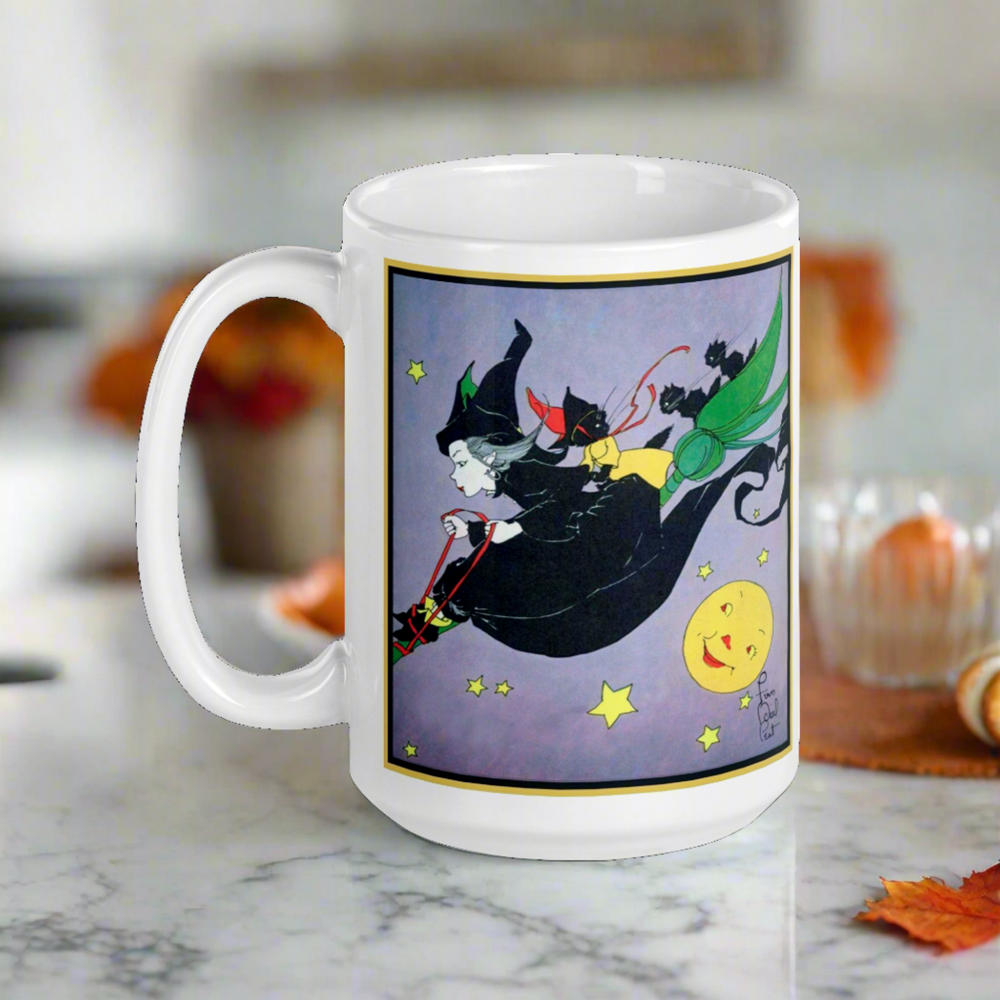 This ceramic glossy mug features a vintage Halloween illustration by Fern Bisel Peat. It features a witch dressed in all black soaring through the air on her broom with black cats. There is a smiling full yellow moon.