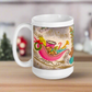 This ceramic glossy coffee mug features a midcentury Christmas illustration of Santa in a teal blue car convertible with a christmas tree in the back seat, the car is pulling his pink sleigh of presents.