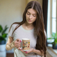 This ceramic glossy coffee mug features a page from a French Magazine from 1938 featuring Halloween Costume patterns.