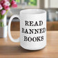 This ceramic glossy white coffee mug features black lettering that says Read Banned Books.