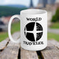 This white ceramic glossy mug features a retro print of an airplane over a globe with atomic lettering that says World Traveler.