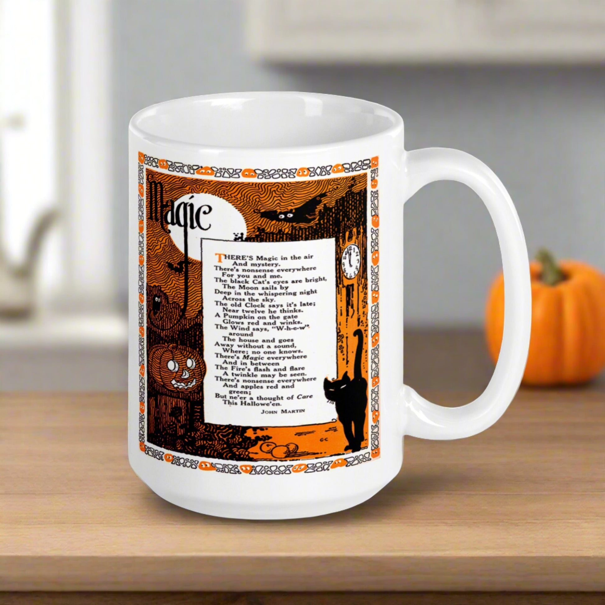 This glossy ceramic coffee mug features a vintage Halloween print of a poem titled Magic by John Martin. The illustration features a full moon, jack o'lantern, black cat, owls, bats and a clock.