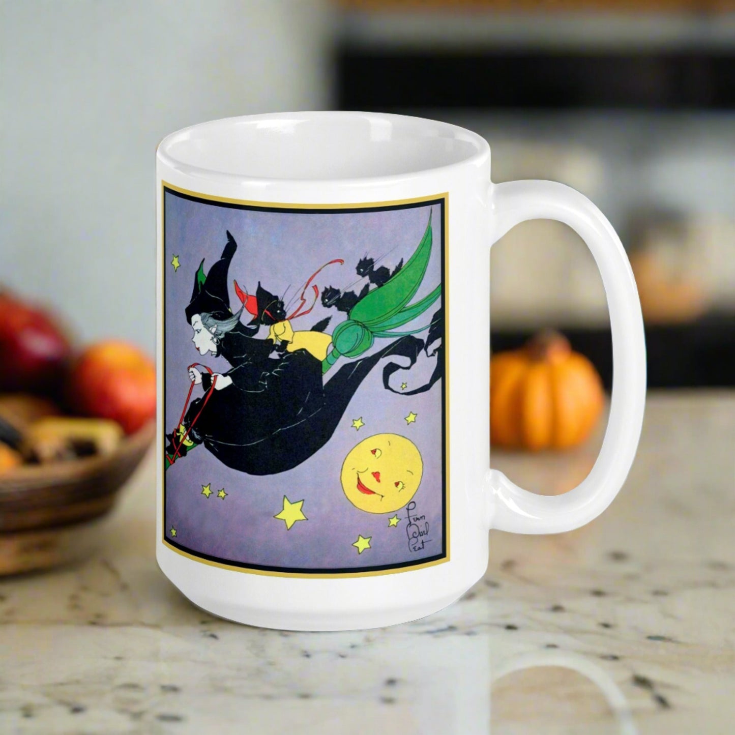 This ceramic glossy mug features a vintage Halloween illustration by Fern Bisel Peat. It features a witch dressed in all black soaring through the air on her broom with black cats. There is a smiling full yellow moon.