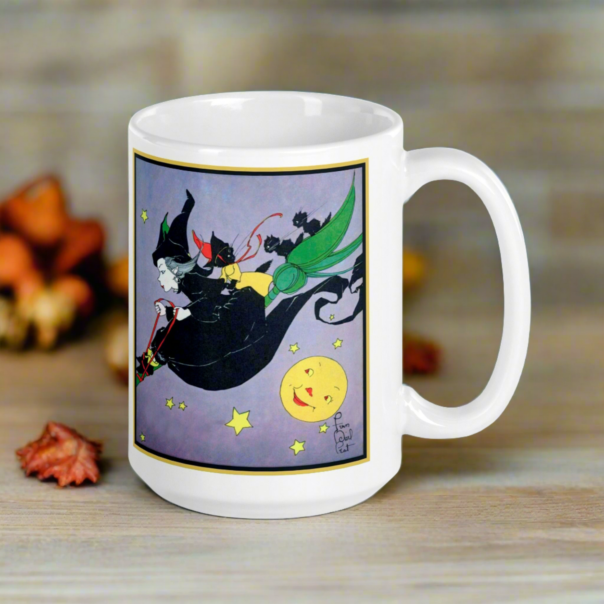 This ceramic glossy mug features a vintage Halloween illustration by Fern Bisel Peat. It features a witch dressed in all black soaring through the air on her broom with black cats. There is a smiling full yellow moon.