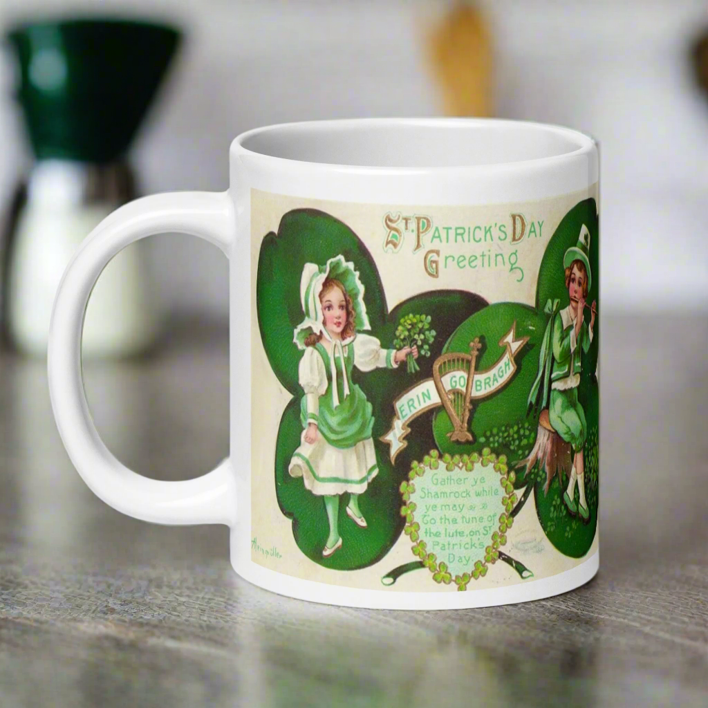 This glossy coffee mug features a retro illustration that says St. Patrick's Day Erin Go Bragh, alongside a festive Irish blessing:
"Gather ya Shamrock while ye may, Go to the tune of the lute on St. Patrick’s Day."